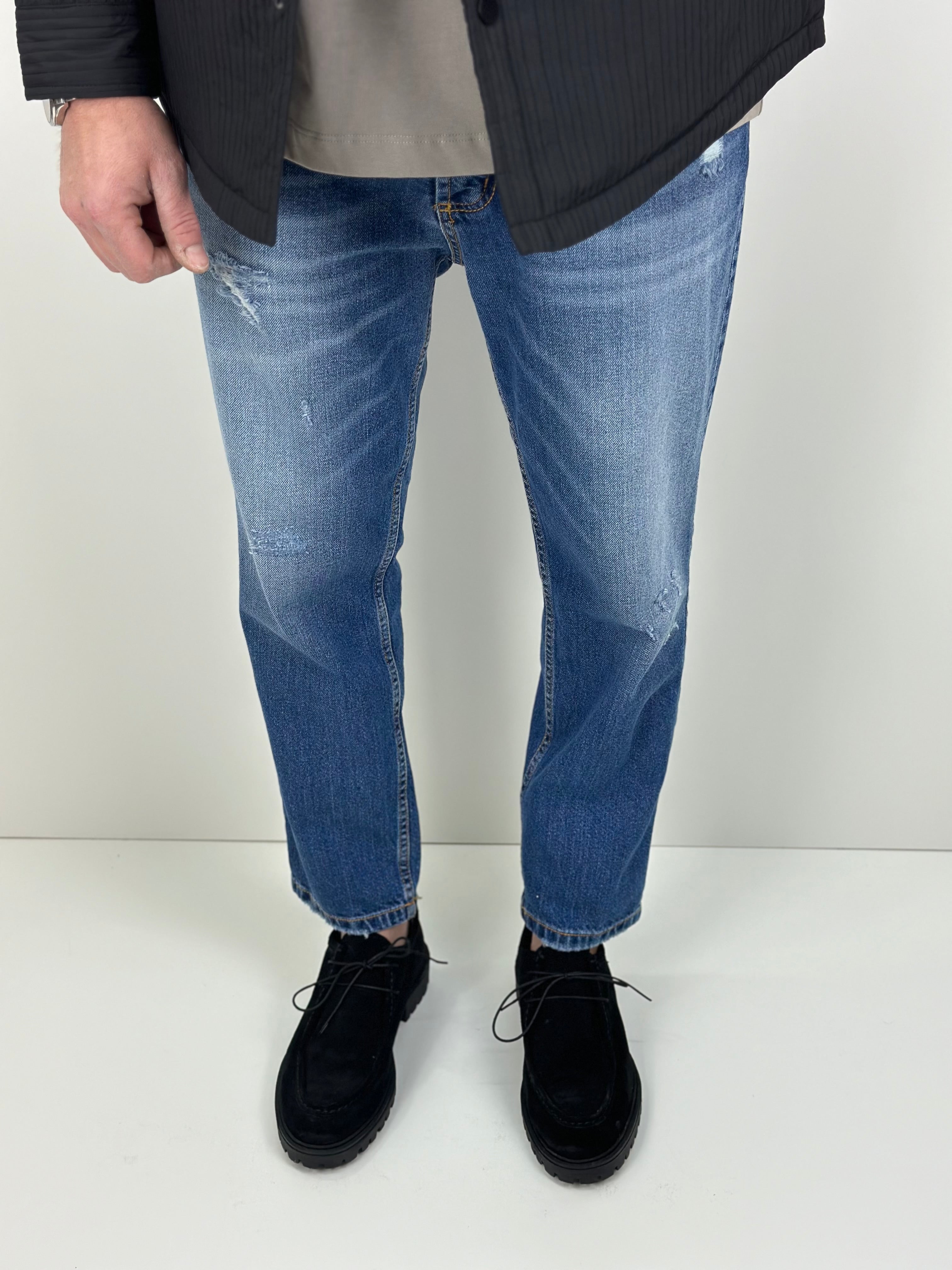 Jeans slim cropped con strappi